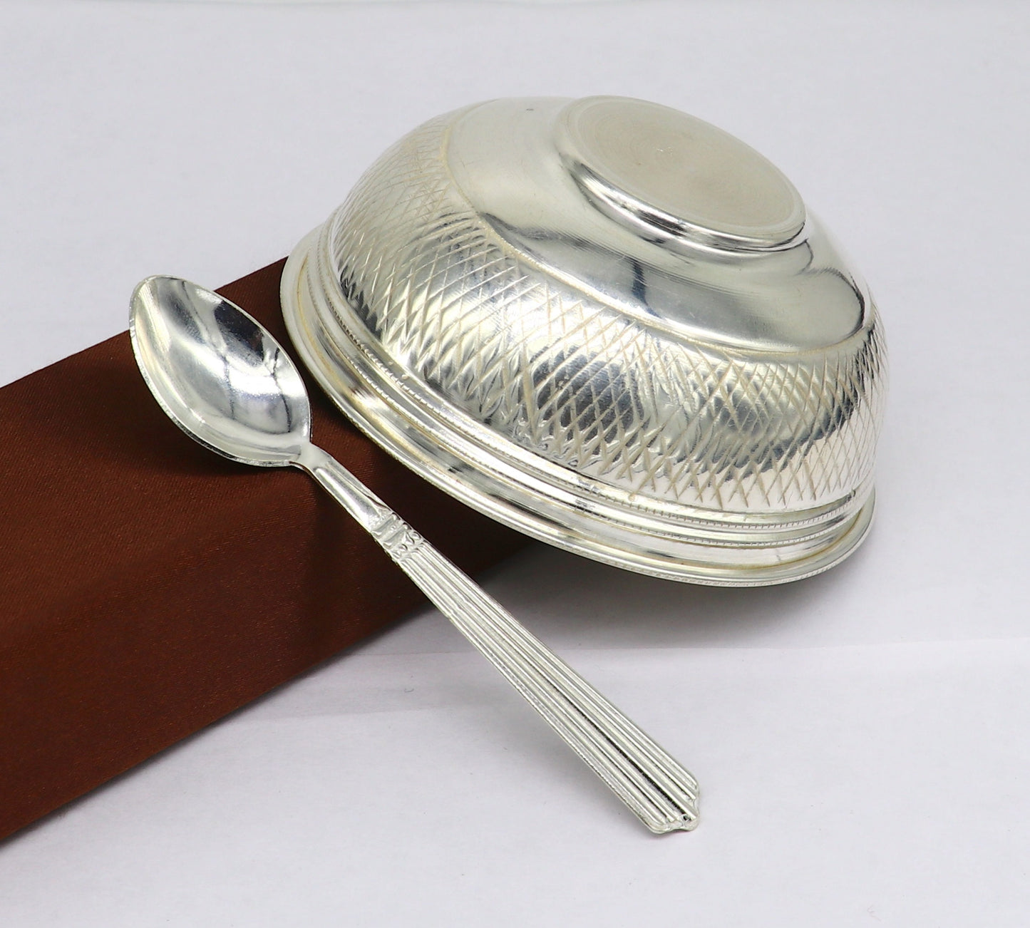 Handcrafted 999 fine silver baby bowl and spoon set by Tribal Ornaments, traditional puja silver utensils and vessel for infants.
