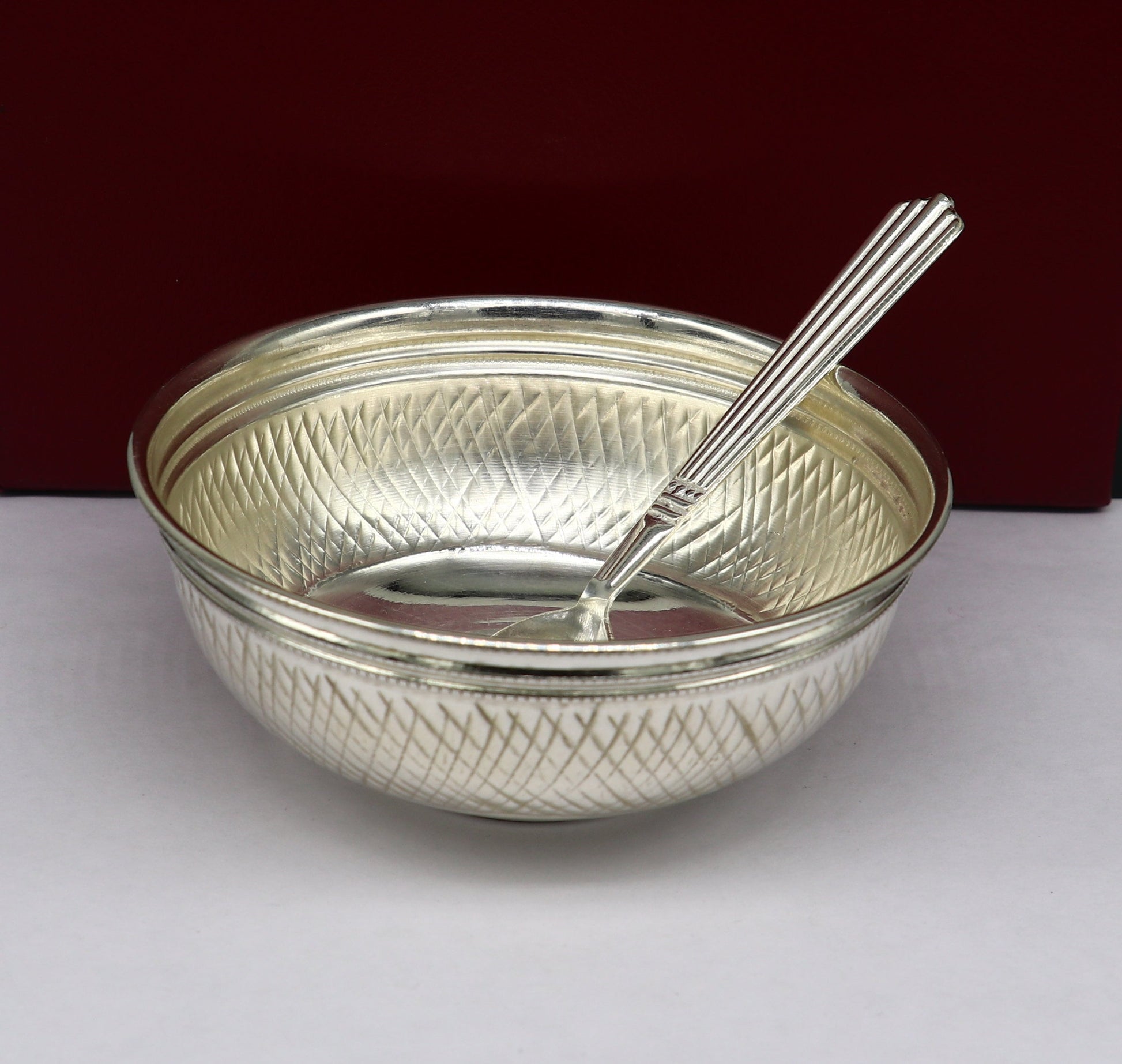 Handcrafted 999 fine silver baby bowl and spoon set with puja utensils, traditional silver vessel by Tribal Ornaments.
