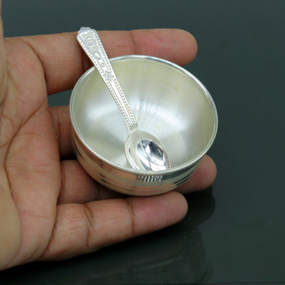 Handmade 999 fine silver bowl and spoon set by TRIBAL ORNAMENTS, featuring antibacterial silver for kids' health and safety.