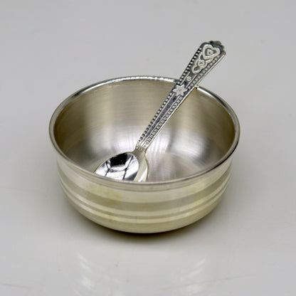 Handmade 999 fine silver bowl and spoon set by TRIBAL ORNAMENTS, featuring antibacterial properties for healthy kids and babies.