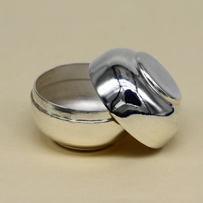 Handmade 999 fine silver small idol Prasad and trinket box with intricate tribal design from Tribal Ornaments.