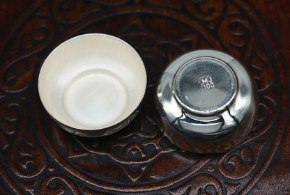 Handmade 999 fine silver small idol Prasad and trinket box with intricate tribal design, solid silver container for Sindur or valuables.