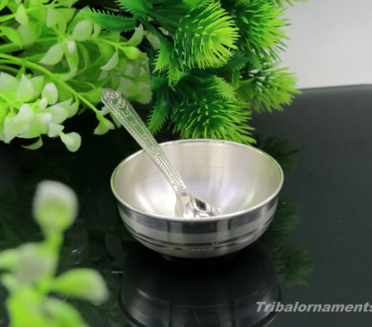 Handmade 999 fine silver baby feeding bowl by TRIBAL ORNAMENTS, small pure silver vessel for home and kitchen use in India.