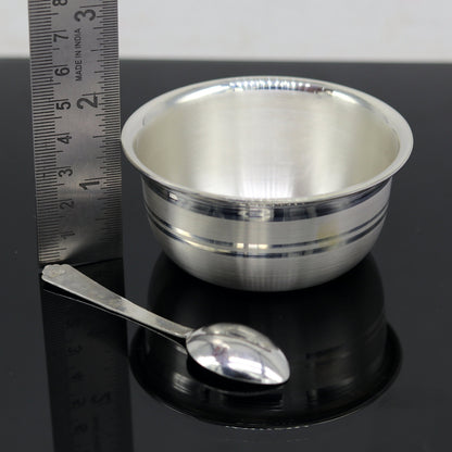 Handmade 999 fine silver bowl and spoon set by TRIBAL ORNAMENTS, traditional serving utensils for food or puja rituals.