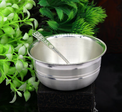 Handmade 999 fine silver bowl and spoon set for food serving, with intricate tribal design, ideal for puja or gifting.