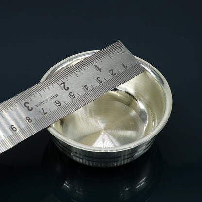 Handmade 999 fine silver baby food bowl and spoon set by TRIBAL ORNAMENTS, crafted silver kitchen and puja utensils for infants.