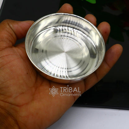 Handmade 999 fine silver tray from Tribal Ornaments, perfect for serving baby food or puja rituals, with intricate design.