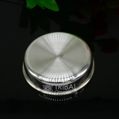 Handmade 999 fine silver tray for serving baby food, part of TRIBAL ORNAMENTS' silver utensils and puja silver articles collection.