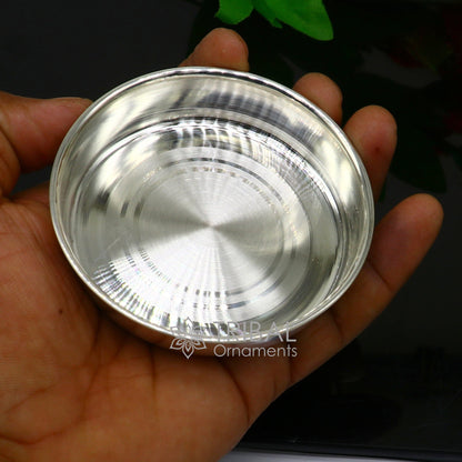 Handmade 999 fine silver tray by Tribal Ornaments, perfect for serving baby food or puja rituals with elegant silver utensils.