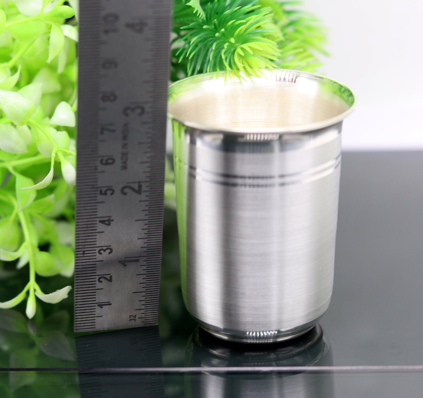 Handmade 999 fine silver milk tumbler and flask by TRIBAL ORNAMENTS, crafted for baby water and rice ceremony use.