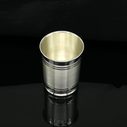 Handmade 999 fine silver water and milk glass tumbler with silver flask and utensils for kids, designed as a healthy gift by TRIBAL ORNAMENTS.