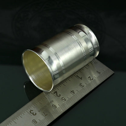 Handmade 999 fine silver water and milk glass tumbler with matching silver cup and spoon for kids, antibacterial silver utensils by TRIBAL ORNAMENTS.