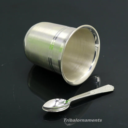 Handmade 999 fine silver water and milk tumbler, silver flask, and baby silver utensils set by TRIBAL ORNAMENTS for healthy living.