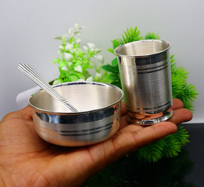 Fine silver water milk glass, bowl, and spoon set by Tribal Ornaments, featuring silver baby food utensils and decorative silver details.