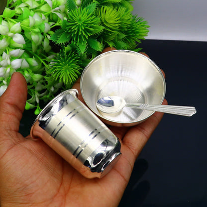 Fine silver water and milk glass set with bowl, tumbler, spoon, and utensils for serving food, by TRIBAL ORNAMENTS.