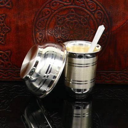 Silver baby set including milk glass, bowl, tumbler, spoon, and utensils in 999 fine silver by Tribal Ornaments.