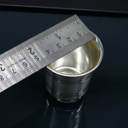 Silver baby set with water glass, milk glass, bowl, tumbler, spoon, and utensils made of 999 fine silver by Tribal Ornaments.