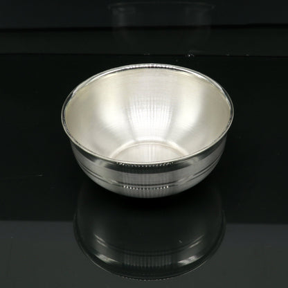 Handmade 999 fine solid silver bowl with intricate design, ideal as a baby gift or puja utensil from Tribal Ornaments India.