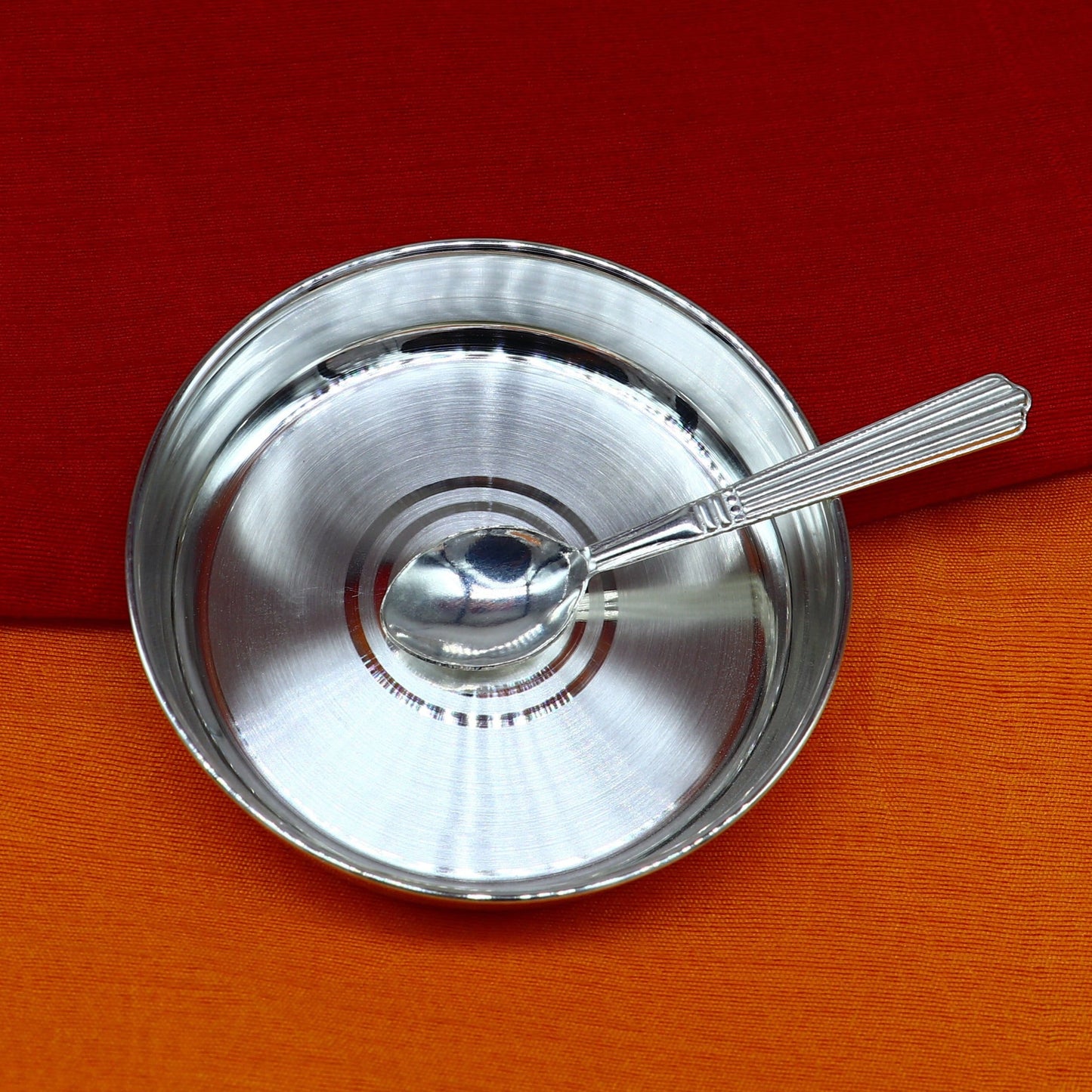 Solid silver handmade baby food serving tray by Tribal Ornaments, traditional utensil for rice ceremonies and kids' gifts in India.
