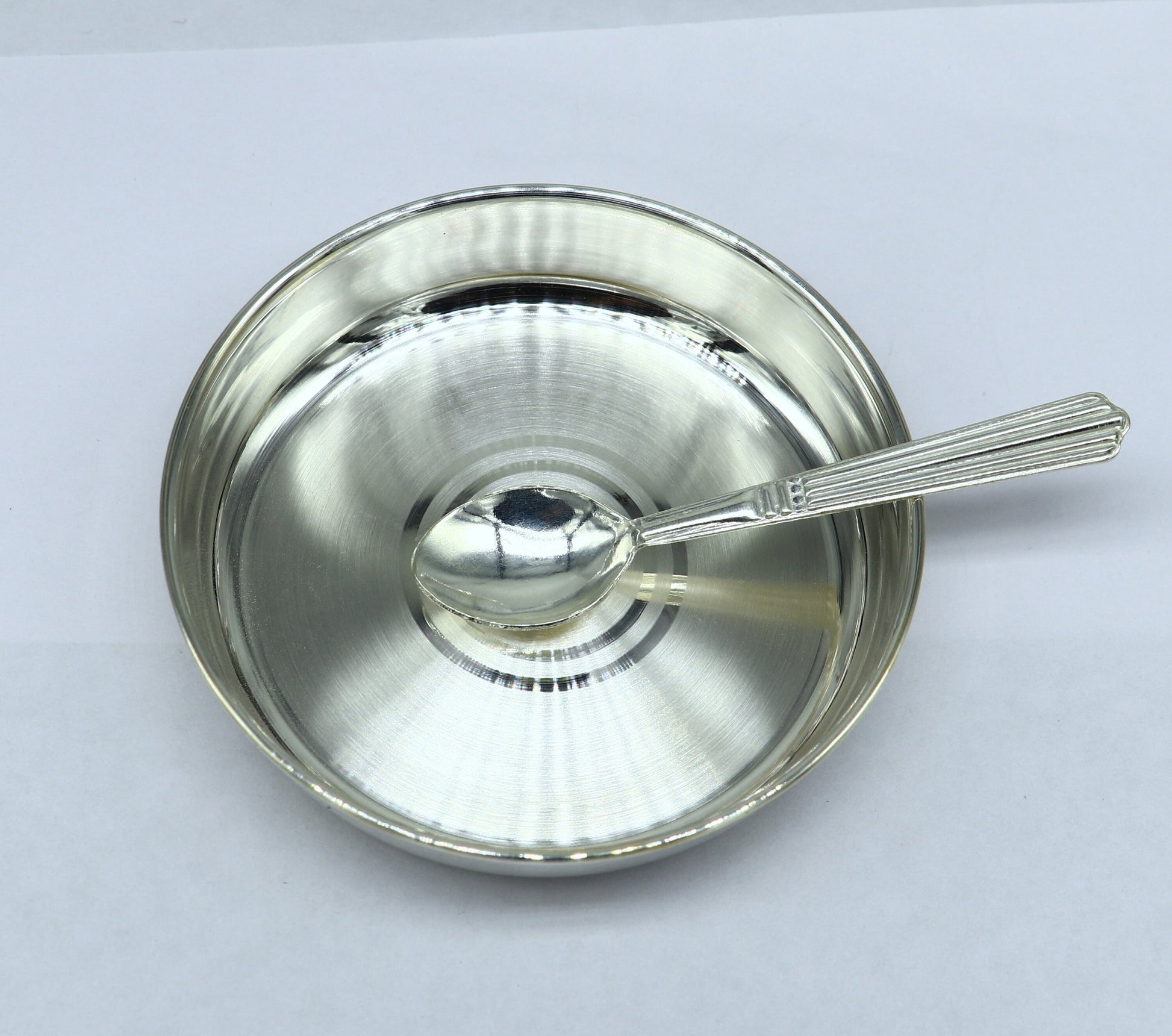 Solid silver handmade baby food tray by Tribal Ornaments, perfect for rice ceremony and Annaprashana serving utensils.