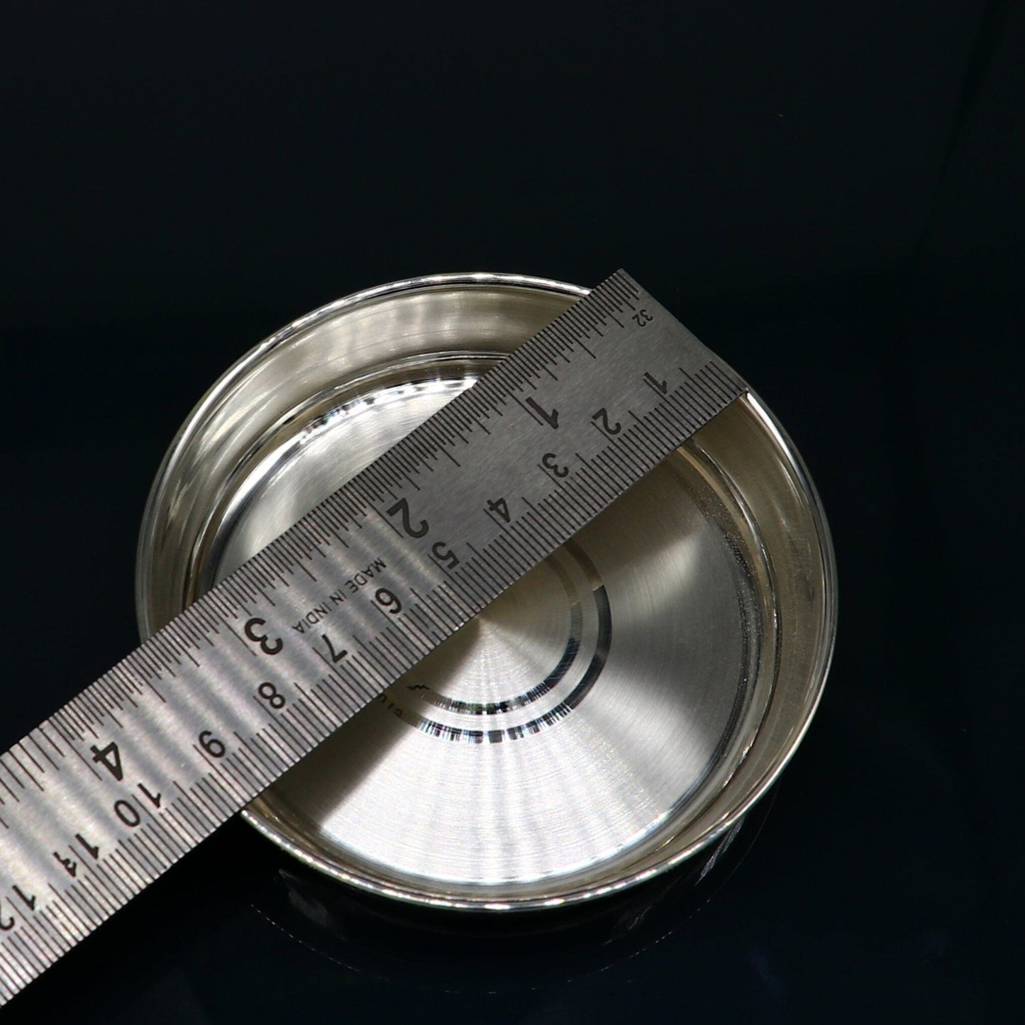 Solid silver handmade baby food tray by Tribal Ornaments, ideal for rice ceremony or Annaprashana serving utensils in India.