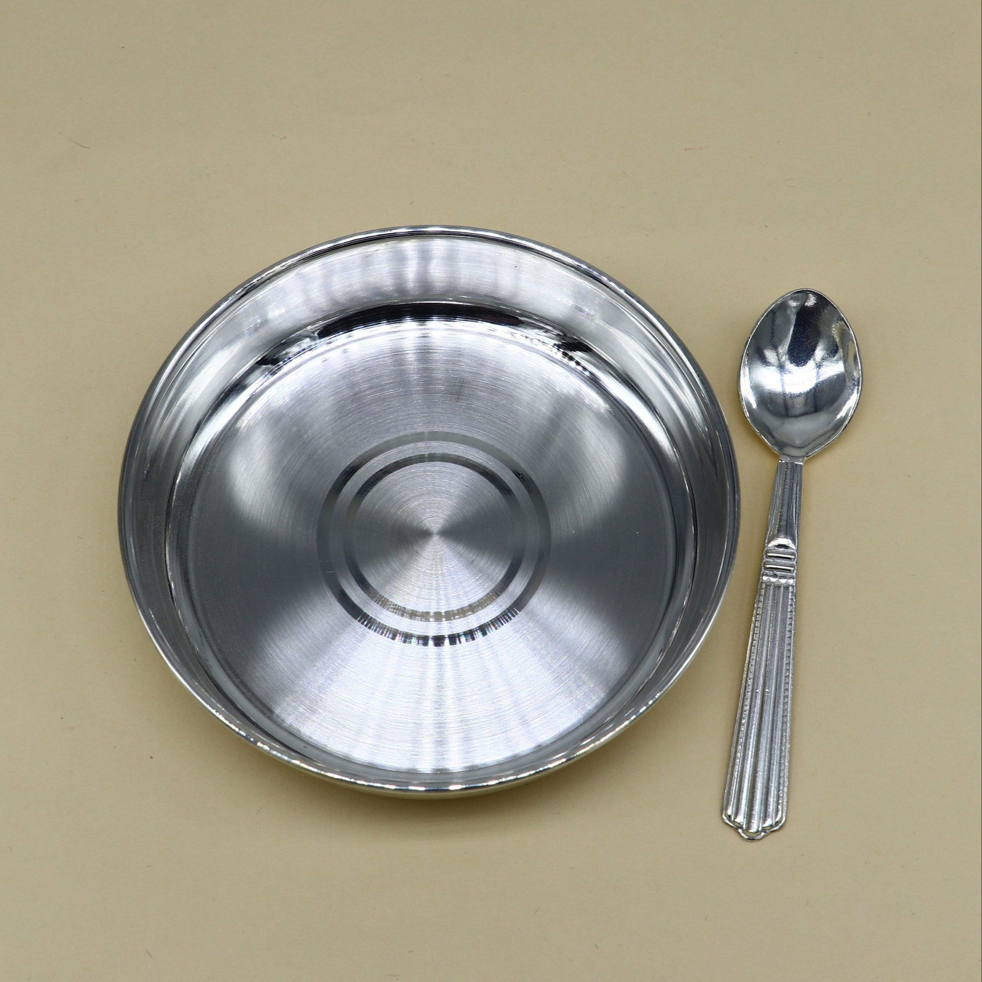 Solid silver handmade baby food tray by Tribal Ornaments, ideal for rice ceremony or Annaprashana serving utensils.