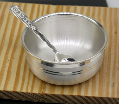 Handmade 999 pure silver bowl and spoon set by TRIBAL ORNAMENTS, featuring antibacterial silver for kids' health.