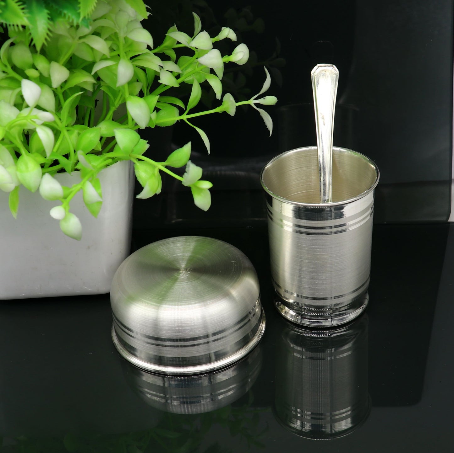 Pure silver combo bowl and water/milk tumbler from TRIBAL ORNAMENTS, featuring traditional silver vessels and baby utensils.