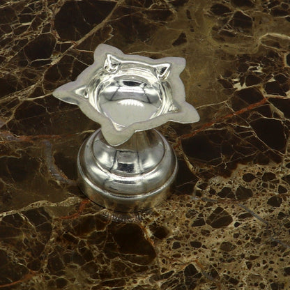 Handmade 999 pure silver oil lamp with intricate design, ideal for home temple, silver diya, deepak, and puja rituals.