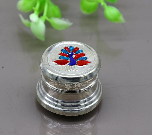 Silver trinket box with peacock design, round shape, from Tribal Ornaments, ideal for jewelry, kajal, sindur, or gifting.