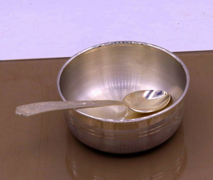 Handmade sterling silver bowl and spoon set with antibacterial properties, crafted by TRIBAL ORNAMENTS, featuring intricate tribal design.