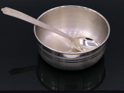 Handmade sterling silver bowl and spoon set with antibacterial properties, crafted by Tribal Ornaments, showcasing intricate silver craftsmanship.