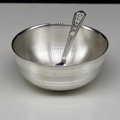 Handmade 999 pure sterling silver baby serving bowl and spoon set by TRIBAL ORNAMENTS, featuring solid silver vessels for healthy serving.