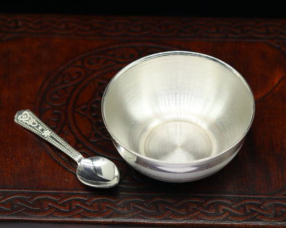 Handmade sterling silver bowl and spoon set by TRIBAL ORNAMENTS, featuring a healthy serving bowl and baby utensils in solid silver.