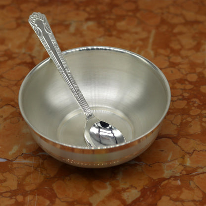 Handmade 999 pure sterling silver bowl and spoon from TRIBAL ORNAMENTS, featuring antibacterial properties and traditional craftsmanship.