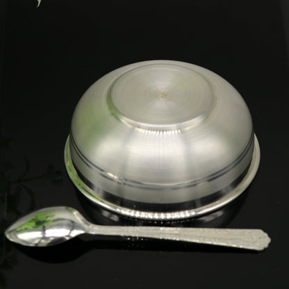 Handmade 999 pure sterling silver bowl and spoon set by TRIBAL ORNAMENTS, featuring antibacterial properties and intricate craftsmanship.