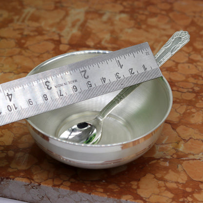 Handmade solid sterling silver bowl and spoon by TRIBAL ORNAMENTS, showcasing antibacterial properties and intricate craftsmanship.