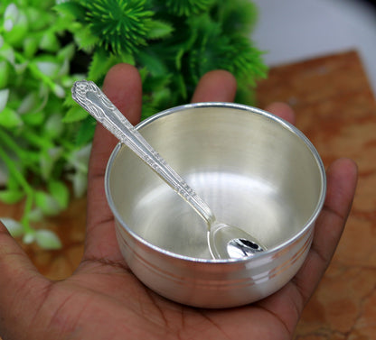 Handmade 999 pure sterling silver bowl and spoon by TRIBAL ORNAMENTS, featuring antibacterial properties and sleek design.