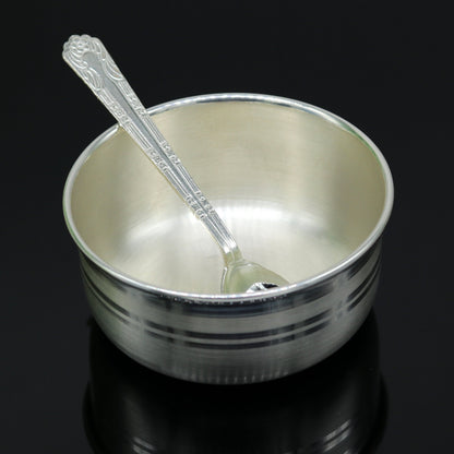 Handmade sterling silver bowl and spoon by TRIBAL ORNAMENTS, featuring antibacterial properties and a polished, traditional design.