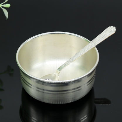 Handmade 999 pure sterling silver bowl and spoon set by TRIBAL ORNAMENTS, featuring antibacterial silver vessels for health.