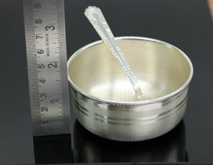 Handmade sterling silver bowl and spoon set by TRIBAL ORNAMENTS, featuring antibacterial properties and intricate craftsmanship.