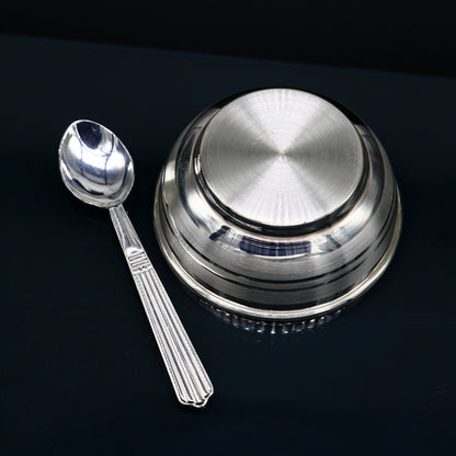 Handmade 999 pure sterling silver bowl and spoon set for babies, featuring a healthy serving vessel and utensils by Tribal Ornaments.