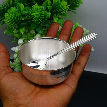 Handmade 999 pure sterling silver baby bowl and spoon set with intricate designs, ideal for healthy baby food serving.