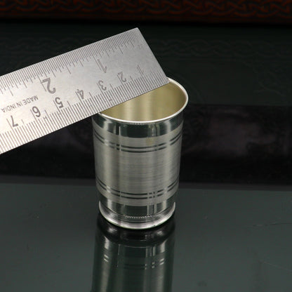Handmade 999 silver baby glass set with tumblers for water and milk, featuring elegant design by Tribal Ornaments.