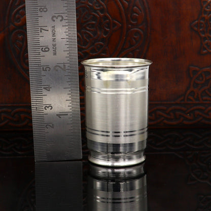 Handmade 999 silver baby glass set including a water/milk tumbler, wine glass, and vodka glass with intricate tribal ornament design.