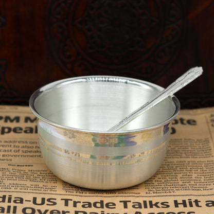 Pure silver handmade utensils set with bowl and spoon for baby feeding, traditional tribal design, elegant silver vessel for serving.