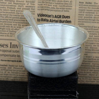 Handmade 999 solid pure silver bowl and spoon set by Tribal Ornaments, ideal for baby feeding and table serving.