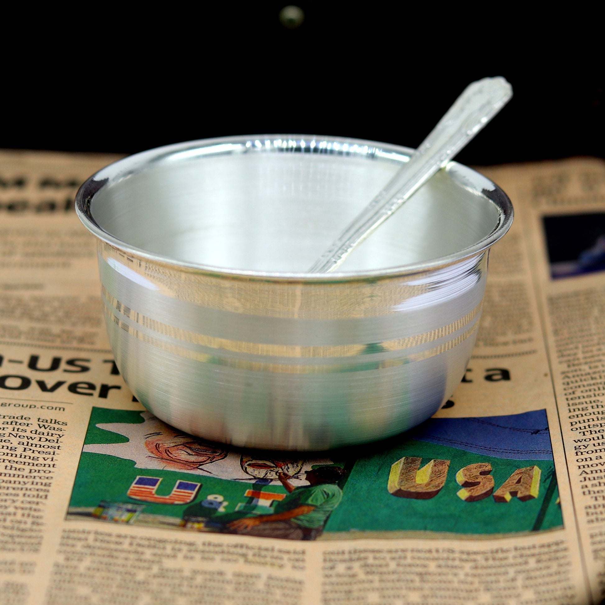 Handmade 999 solid silver utensils bowl and spoon set for baby feeding, crafted by Tribal Ornaments, elegant silver tableware.