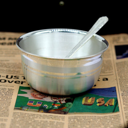 Handmade 999 solid silver utensils bowl and spoon set for baby feeding, crafted by Tribal Ornaments, elegant silver tableware.