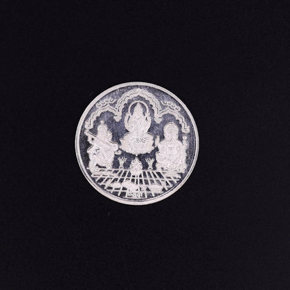999 silver Indian idol coin featuring Lord Ganesha, Laxmi, and Saraswati print, 20 grams, collectible and ideal for gifting.